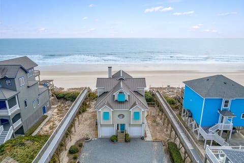 Exterior | Coastal Home with Dual Garages & Beach Access