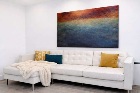 Living Area: A cozy studio living space with a smart open layout perfect for relaxing.