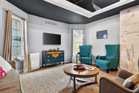 Living Room: The living room offers a stylish and comfortable space perfect for unwinding.