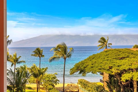 Just steps from the sand, this elevated view showcases Maui’s lush coastline and the calm, blue waters of the Pacific. KS-616