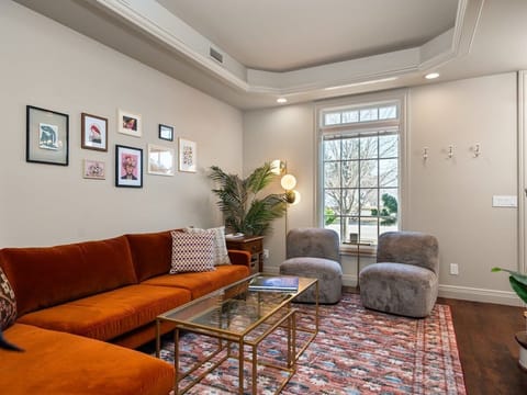 Sink into luxury after a day of exploring! Unwind on our plush velvet sectional, enjoy natural light, or curl up with a book in this thoughtfully curated living space. ✨🛋️