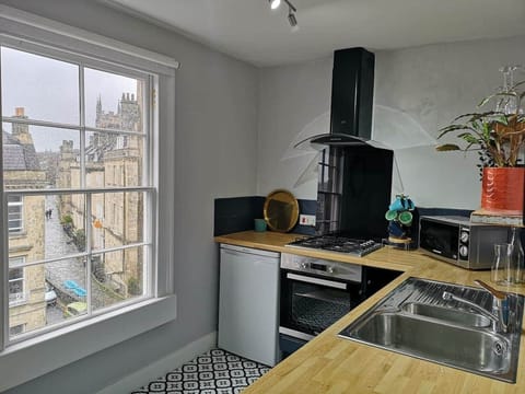 fully equipped kitchen with a new oven and microwave, wonderful views of the Georgian houses outside.