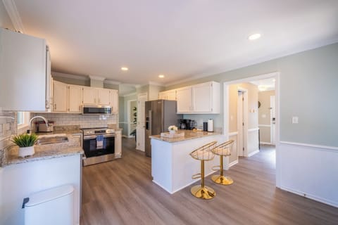 Fully stocked kitchen with coffee station, drip and Keurig.