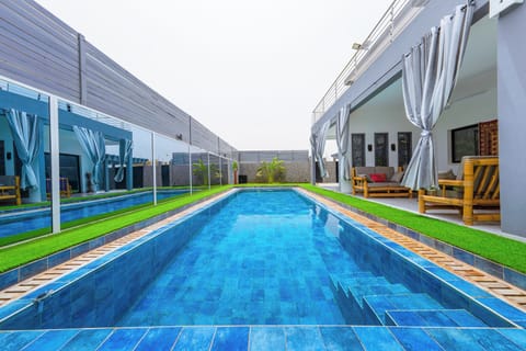 Outdoor pool, pool umbrellas, sun loungers