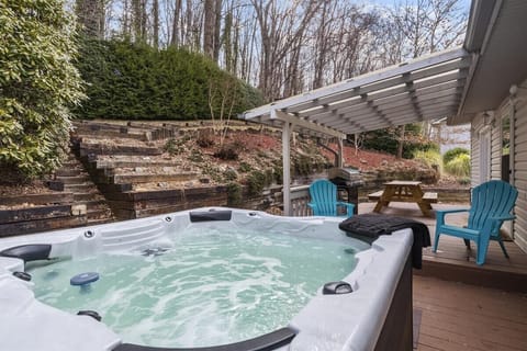 Private hot tub tucked into the backyard -pause and unwind