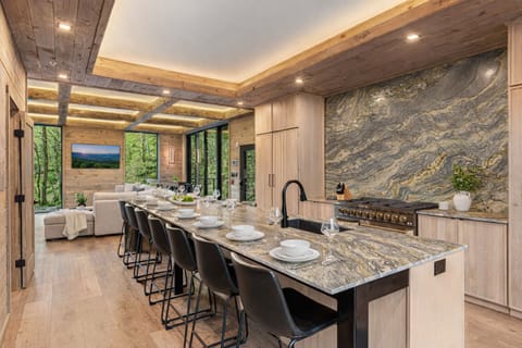 Gather around our gorgeous waterfall stone island with seating for 10!