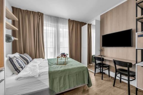 Modern Studio Apartment with Kitchenette, Work Desk & Comfortable Double Bed | Book Now with RENTUJEMY.COM
