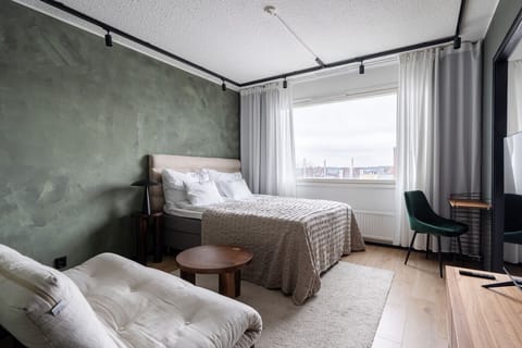 Experience a restful night’s sleep on a premium mattress topped with high-quality linens and plush pillows.