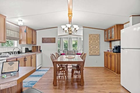 Enjoy meals together at the table for six in the bright, eat-in kitchen, or grab a snack at the bar area.  Perfect for a big breakfast or family dinners.