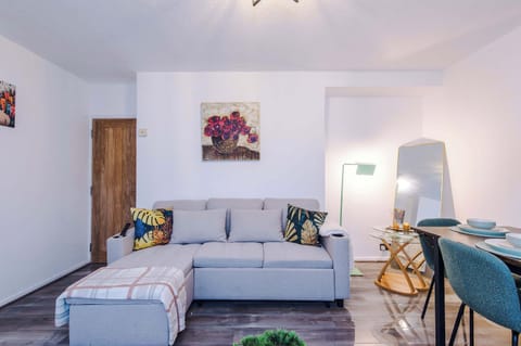 Living Room: Stylish comfort awaits with chic decor and vibrant greenery accents! Perfect for relaxing!