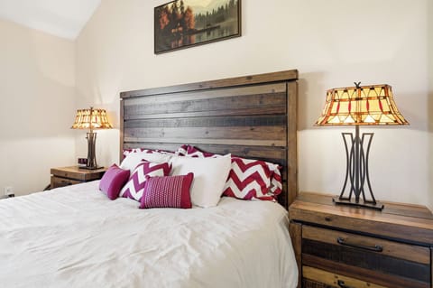 This bedroom features a full bed and comfortable mattress.