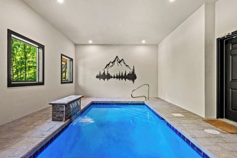 Experience the ultimate vacation luxury in climate-controlled indoor pool room—perfect for a refreshing swim regardless of the season.
