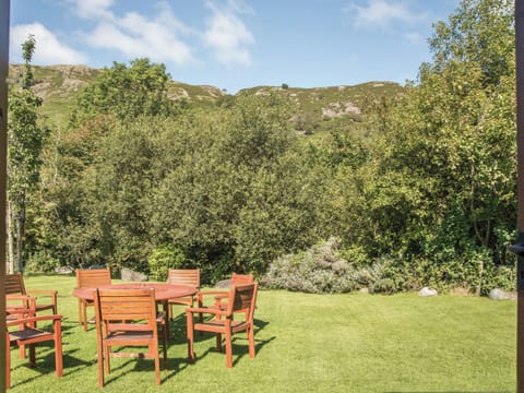 View over garden from back door | Scafell Cottage - Bridge End Farm Cottages, Boot, near Eskdale