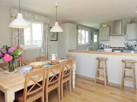 Open plan design with dining area and open aspect to kitchen | Cedar Lodge, Portpatrick