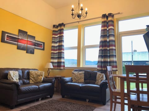 Open plan living space | Science - Old School Apartments, Dalavich