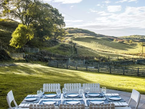 Wonderful rural views from the paved patio area | Blairinnie - Barwhillanty Estate, Parton, near Castle Douglas