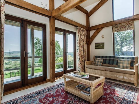 Living area | Orchard Cottage at Mornacott - Mornacott Cottages, Bishops Nympton