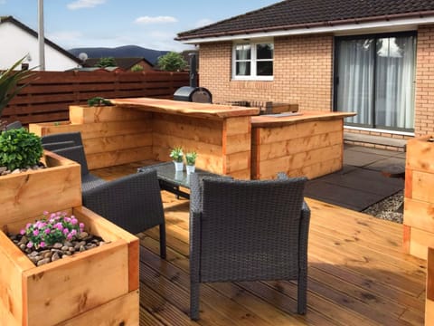 Sitting-out-area | Applewood Cottage - Silverglades Holiday Homes, Aviemore