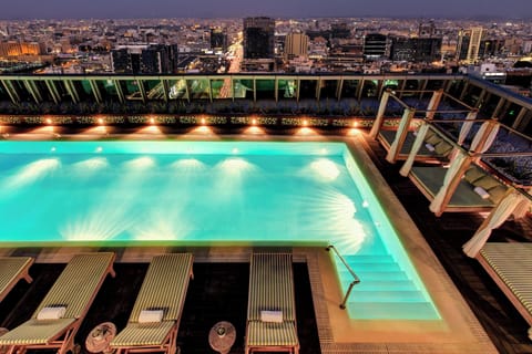 Outdoor pool, open 6:00 AM to 6:00 PM, free cabanas, sun loungers