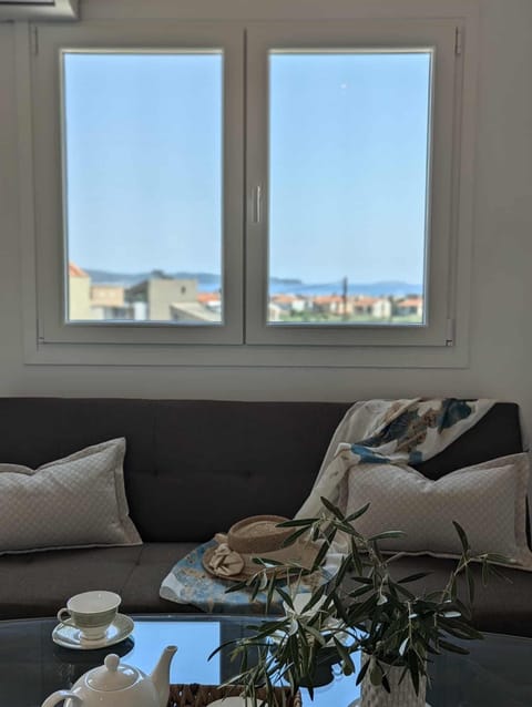 Family Apartment, Balcony, Sea View | Living area | Printers