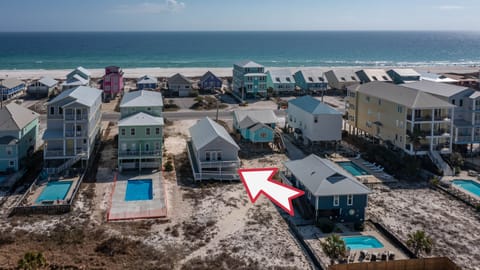 Private balcony with comfortable seating—perfect for morning cof - Private balcony with comfortable seating—perfect for morning coffee and coastal breezes just steps from the beach