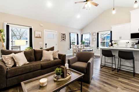 Living Room | Sectional Sofa | Breakfast Bar & Front Door Access