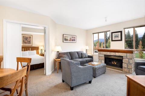 Gather by the glowing fireplace and soak in mountain views.