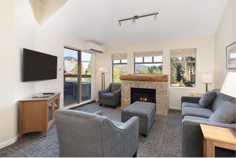 Gather by the cozy fireplace and soak in mountain views.