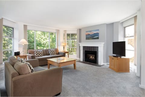 Gather by the cozy fireplace after a day outdoors.