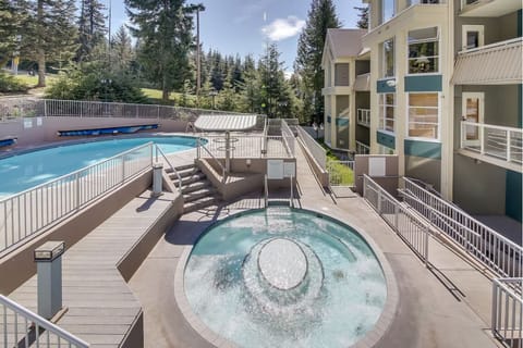 Unwind in bubbling hot tub after a mountain day.