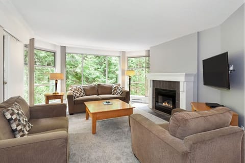 Gather by sunlit windows for relaxed fireside lounging.