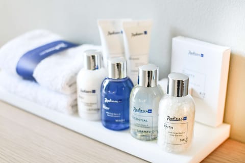 Eco-friendly toiletries, hair dryer, towels