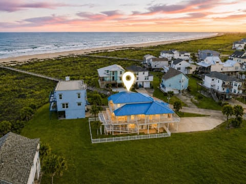 Take Me Awave beach house in Galveston, Texas. Stunning coastal home with ocean views, sunset skies, and steps to sandy shores—perfect for a relaxing seaside getaway for families and friends.