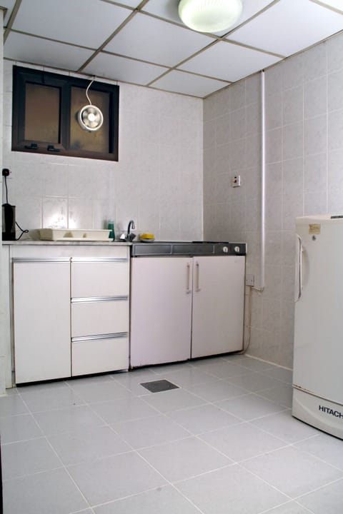 Suite, 2 Bedrooms | Private kitchen | Fridge, stovetop, coffee/tea maker, electric kettle