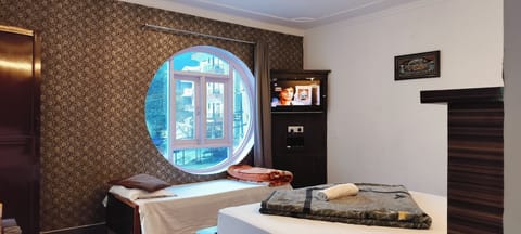 Deluxe Triple Room, Balcony, Mountain View | Free WiFi, bed sheets