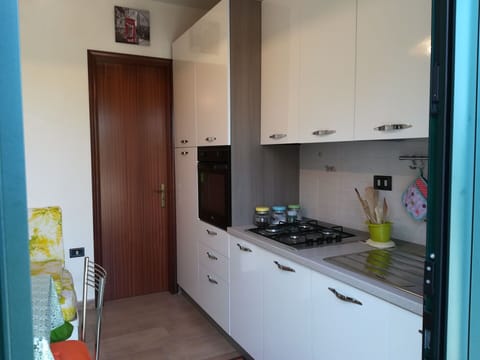 Major Appliance, Kitchen, Flooring, Kitchen Appliance, Interior Design, Countertop, Floor, Cabinetry, Home Appliance, Kitchen Stove