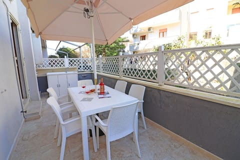 Flooring, Floor, Furniture, Outdoor Furniture, Chair, Outdoor Table, Balcony, Shade, Kitchen & Dining Room Table, Wood Stain