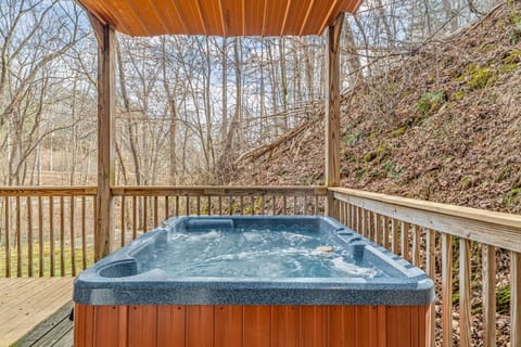 Soak your worries away in your private hot tub, sheltered under a wooden canopy with peaceful forest views all around you.