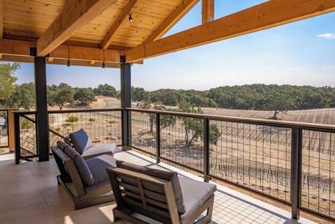 Golden light and vineyard views all around. The perfect spot to unwind and watch the day drift by.