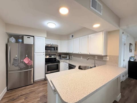 The open kitchen is well equipped for an unforgettable getaway