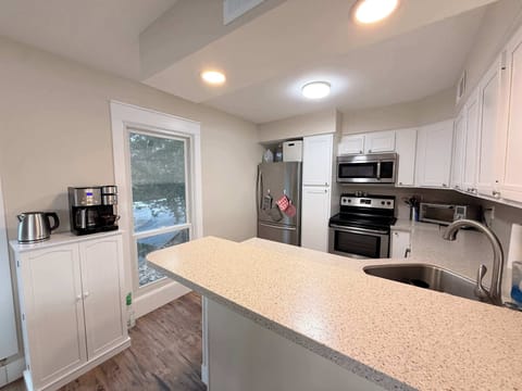 The open kitchen is well equipped for an unforgettable getaway