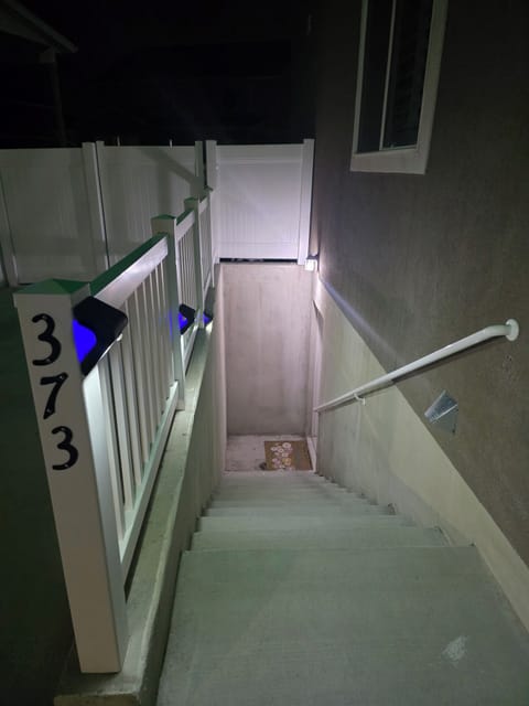 LEDs light every step safely to your private basement entrance. Clear, secure, w
