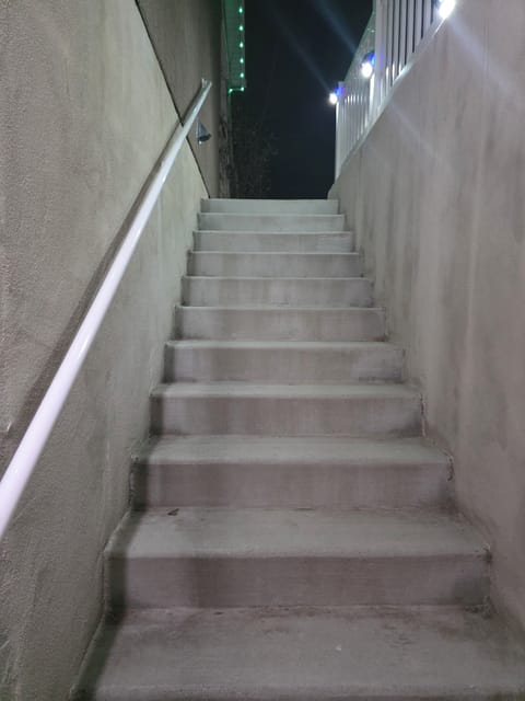 Bright LEDs light up the outdoor staircase at night for safe, easy access to you