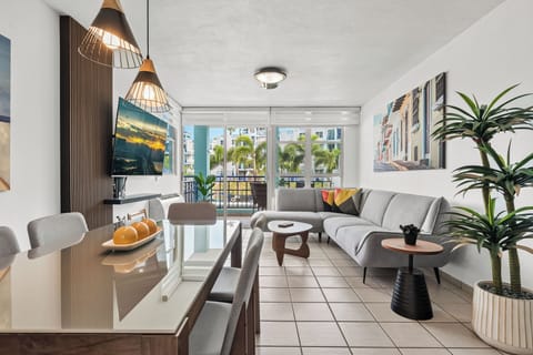 Apartment, Balcony, Pool View | Living area | 32-inch flat-screen TV with cable channels
