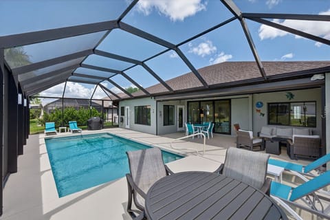 Screened in heated pool deck