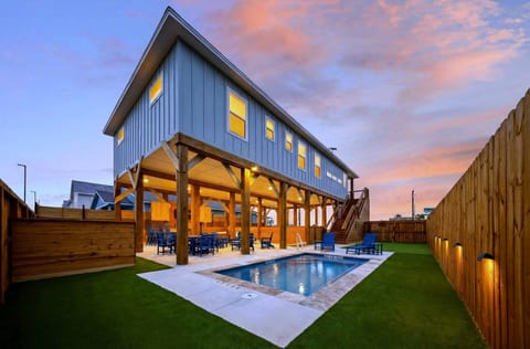 Private backyard pool, covered hangout space, and plenty of room to unwind after the beach.