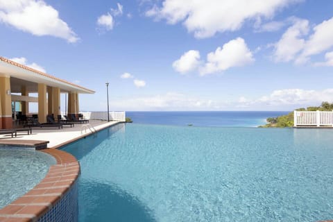 Infinity pool area just steps away from the apartment, no stairs needed.