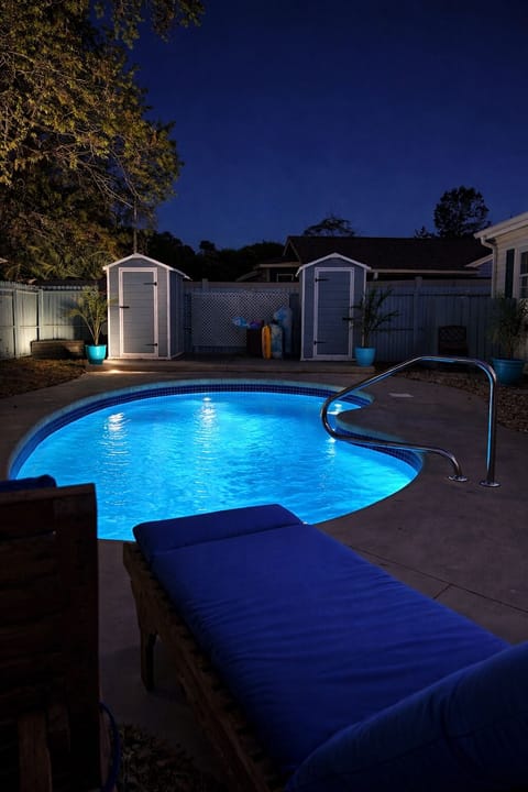 Outdoor pool area at night