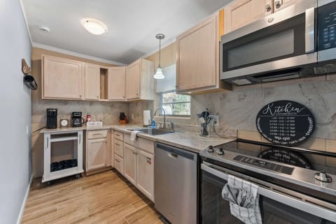 Fully equipped kitchen with stainless appliances and everything needed for cooking