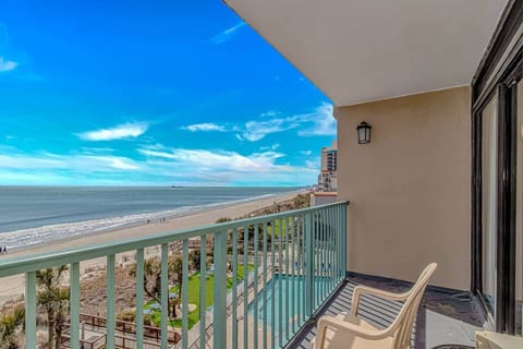 Direct oceanfront balcony • Beach + pool views • Private outdoor seating.